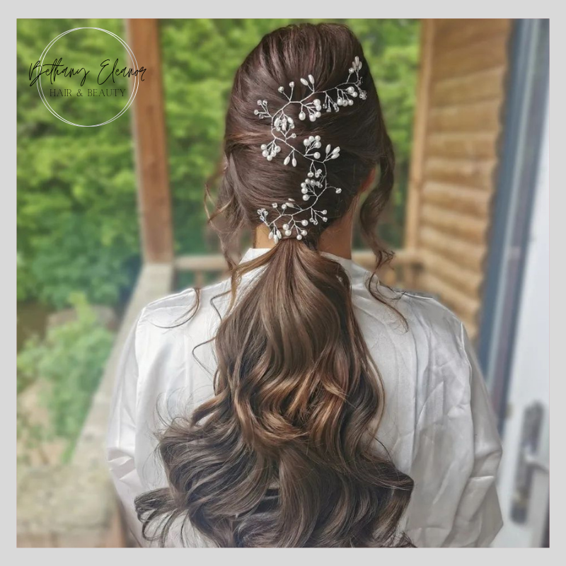 Stunning and elegant low poytail wedding hair with fitted wedding hair clips by Bethany Eleanor